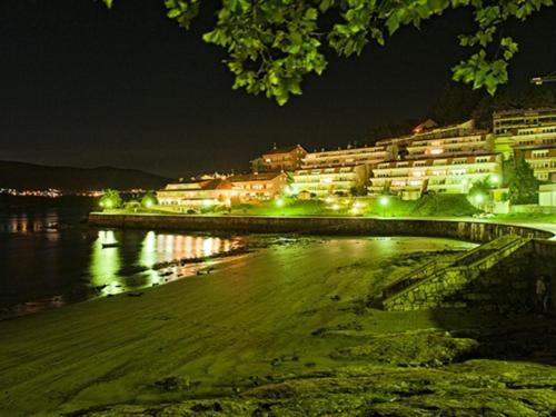 Hotel Corcubion Playa De Quenxe Exteriör bild